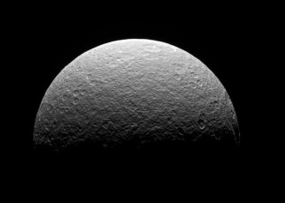 Puzzling signal on Saturn’s moon Rhea may finally be explained