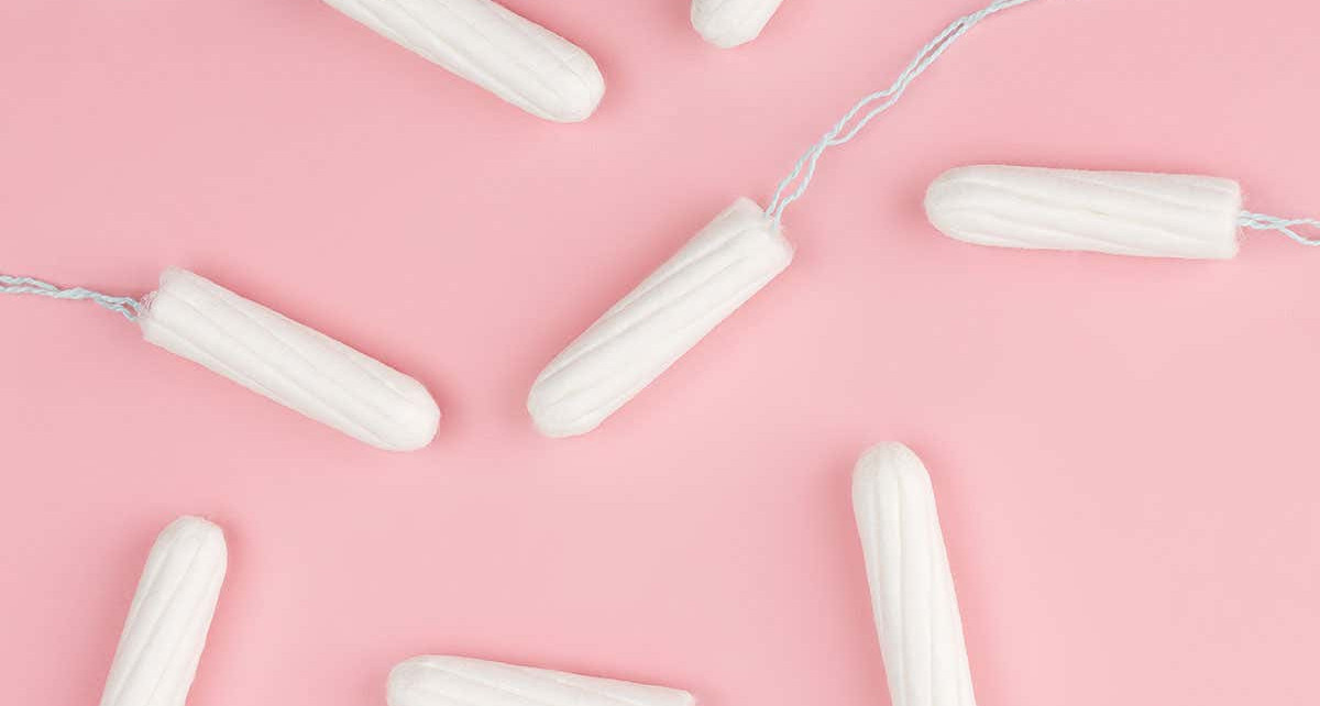 Tampons on pink background
