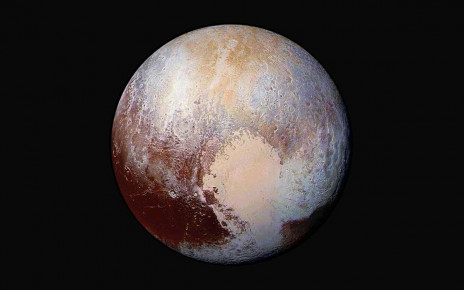 Pluto is covered in huge red patches and we don't know what they are