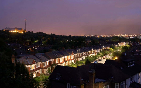 Modern directional environmental street lighting with minimal light pollution on Cranley Gardens at dusk night in Muswell Hill, with Alexandra Palace, London N10, England