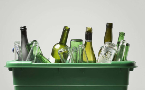 Empty bottles in green container; Shutterstock ID 145222138; purchase_order: 08 Jan 2021 issue; job: 08 Jan 2021 - Feature; client: Photo; other: