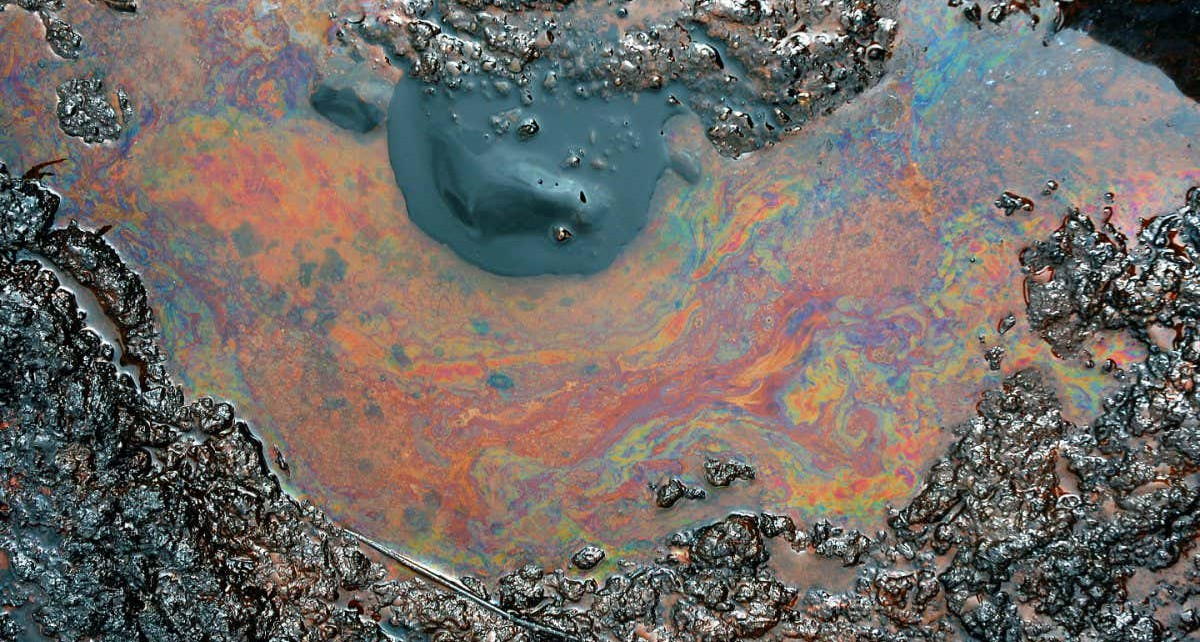 Spills of crude oil on the soil surface - environment pollution.; Shutterstock ID 559184992; purchase_order: -; job: -; client: -; other: -