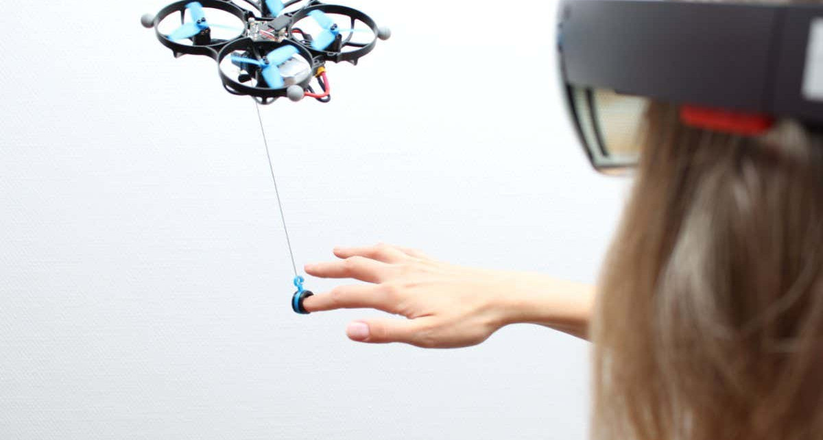 Drones on strings could puppeteer people in virtual reality