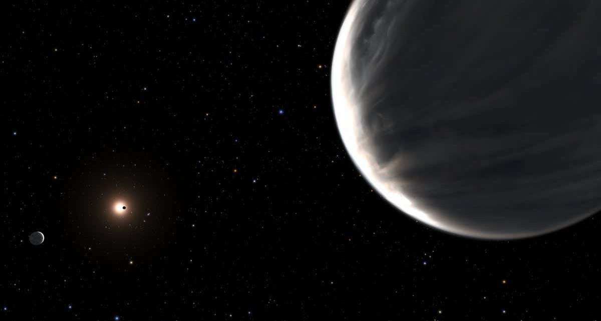 Twin planets orbiting a distant star may be half water