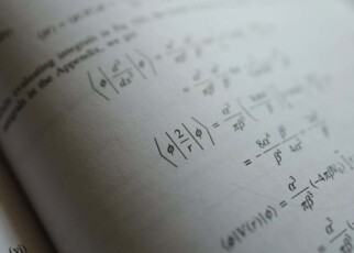 Mathematics equation on quantum mechanic book, selective focus; Shutterstock ID 2181615439; purchase_order: -; job: -; client: -; other: -