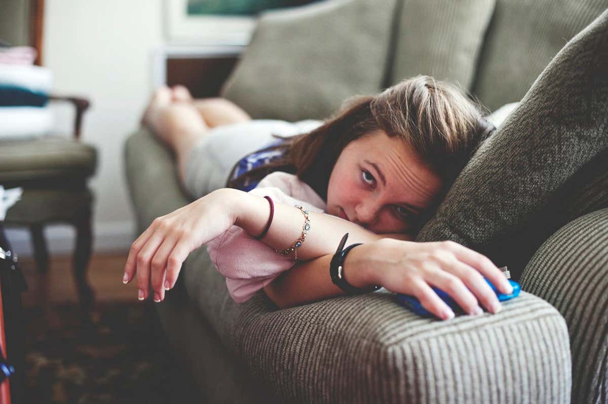 A girl lying on a sofa