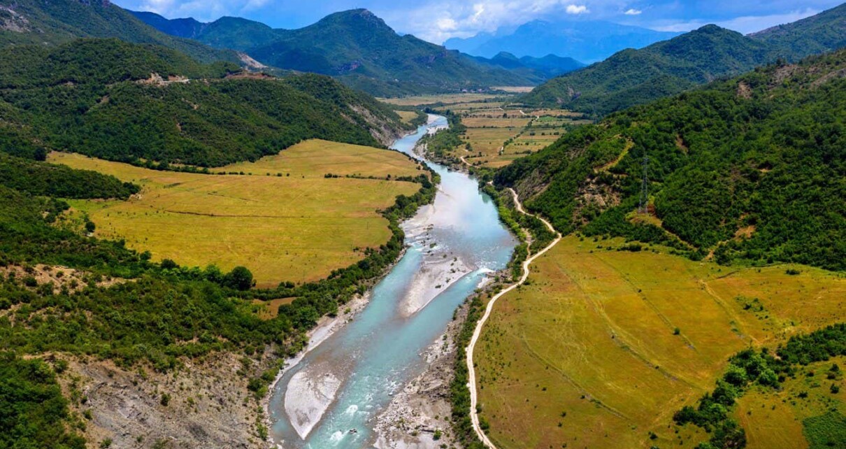 2GAXKAF aerial view of a beautiful Vjosa river, near Earcove, Nemercka mountains, Gjirokastra district, albania