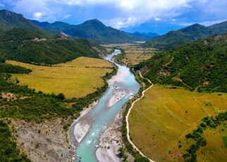 2GAXKAF aerial view of a beautiful Vjosa river, near Earcove, Nemercka mountains, Gjirokastra district, albania