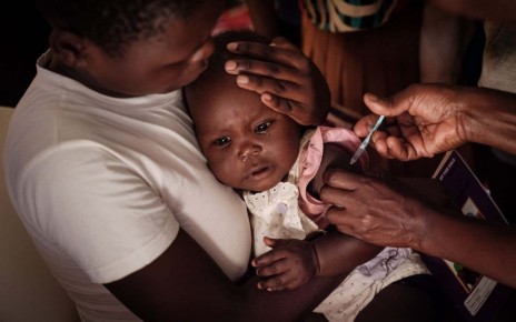 A child receives the RTS malaria vaccine in Gisambai, Kenya, in March