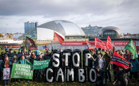 2H56E72 Activists from Friends of the Earth during a demonstration calling for an end to all new oil and gas projects in the North Sea, starting with the proposed Cambo oil field, outside the UK Government's Cop26 hub during the Cop26 summit in Glasgow. Picture date: Sunday November 7, 2021.
