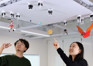 These robots use magnets to cling to the ceiling