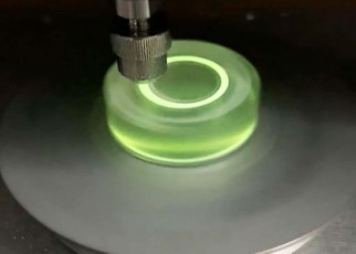3D-printed material glows green under pressure or friction