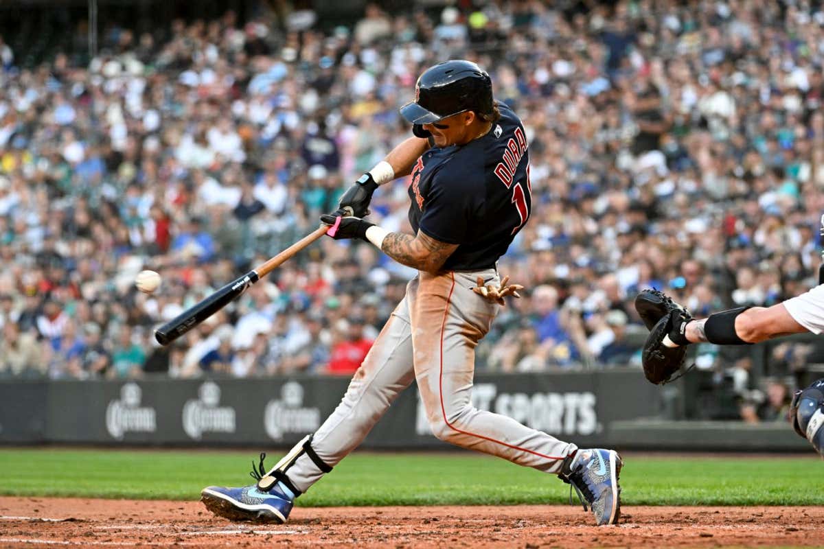 SEATTLE, WASHINGTON - JULY 31: Jarren Duran #16 of the Boston Red Sox hits a single during the fifth inning against the Seattle Mariners at T-Mobile Park on July 31, 2023 in Seattle, Washington. (Photo by Alika Jenner/Getty Images)