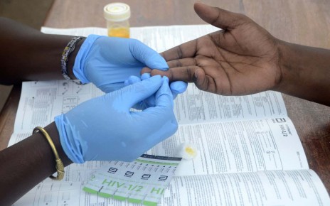 Someone having their blood tested for HIV in Kampala, Uganda, in December 2022