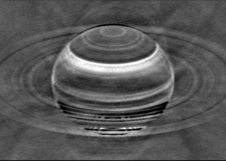 A radio image of Saturn showing traces of past storms