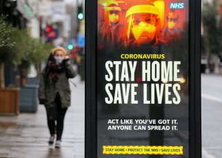 A government covid-19 publicity campaign poster in London in January 2021