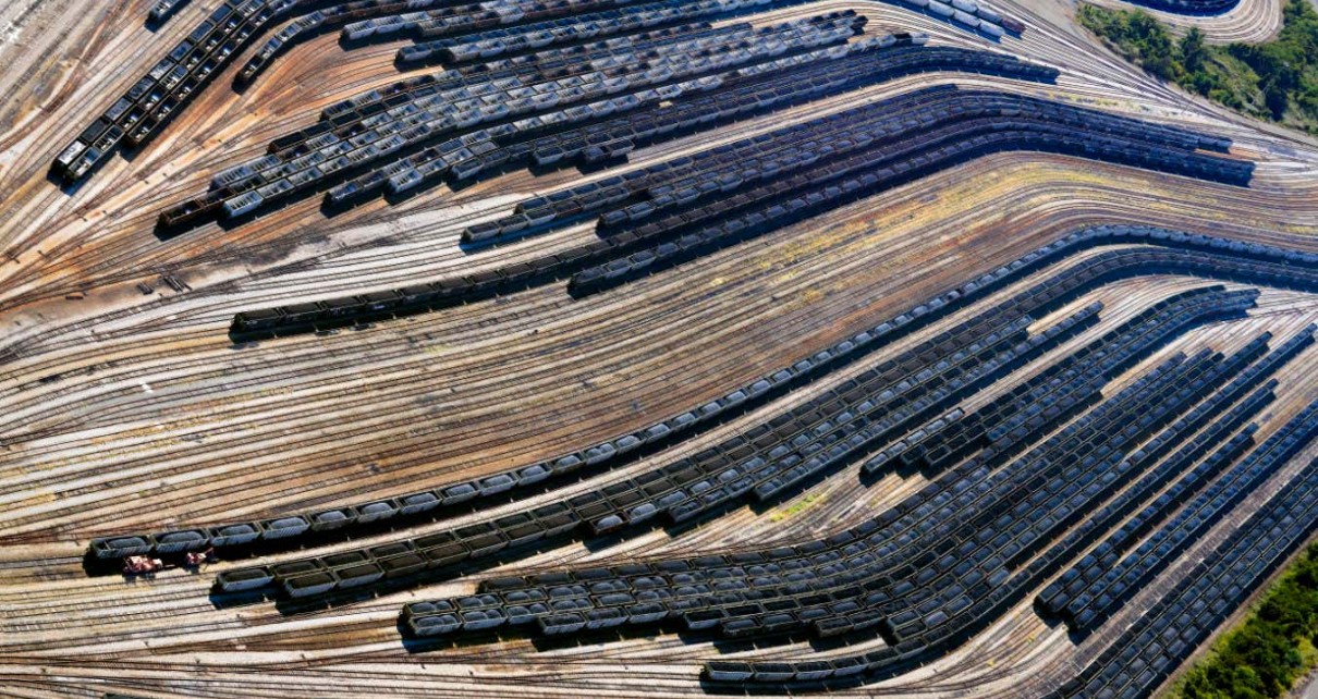 Train cars at terminal loaded with coal