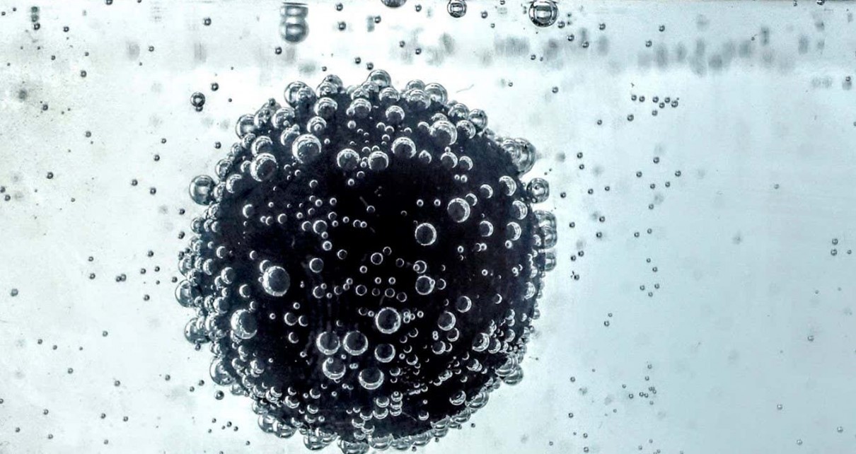 A 3D-printed sphere dancing in carbonated water