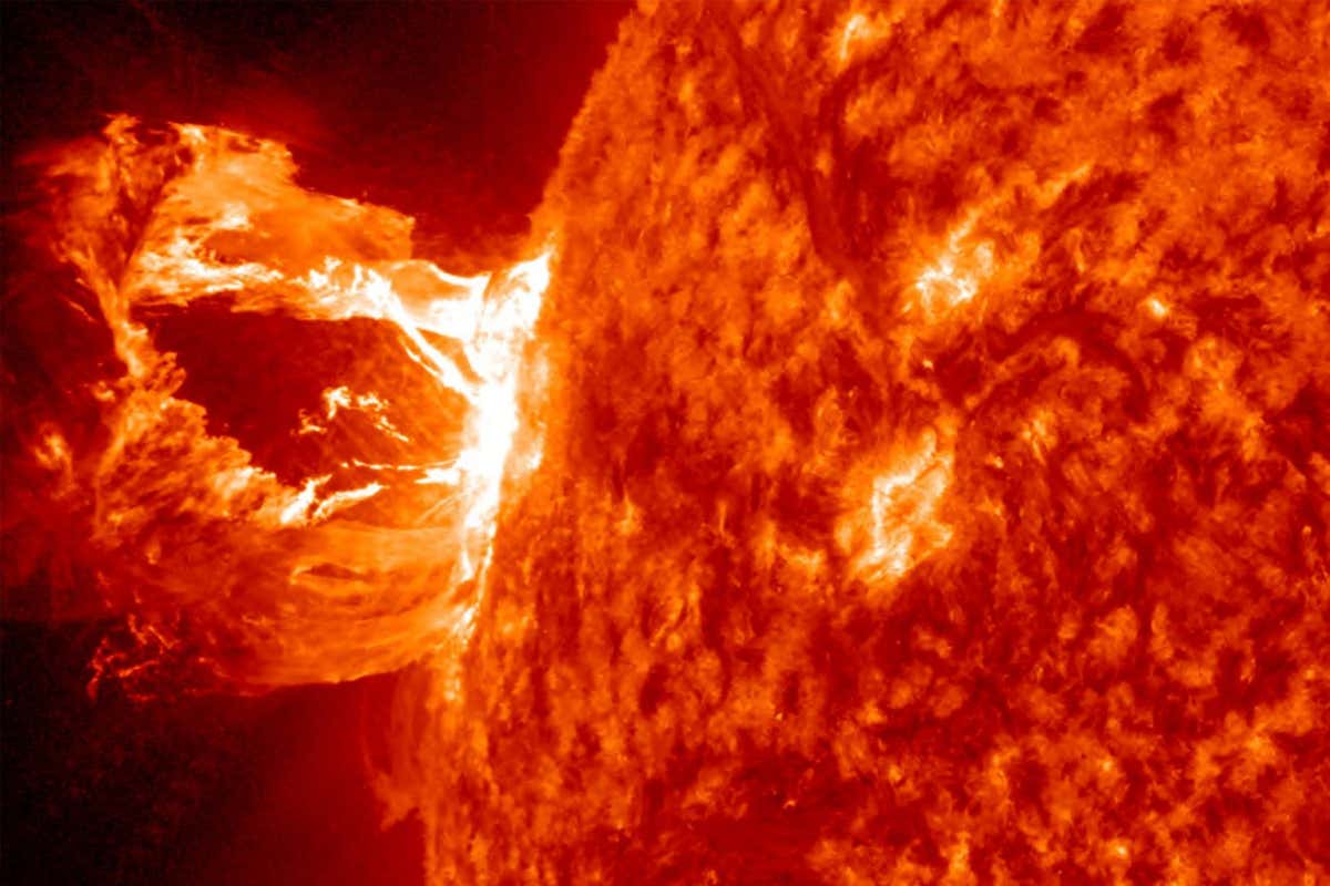 A solar flare, a tremendous explosion on the sun that happens when energy stored in "twisted" magnetic fields is suddenly released