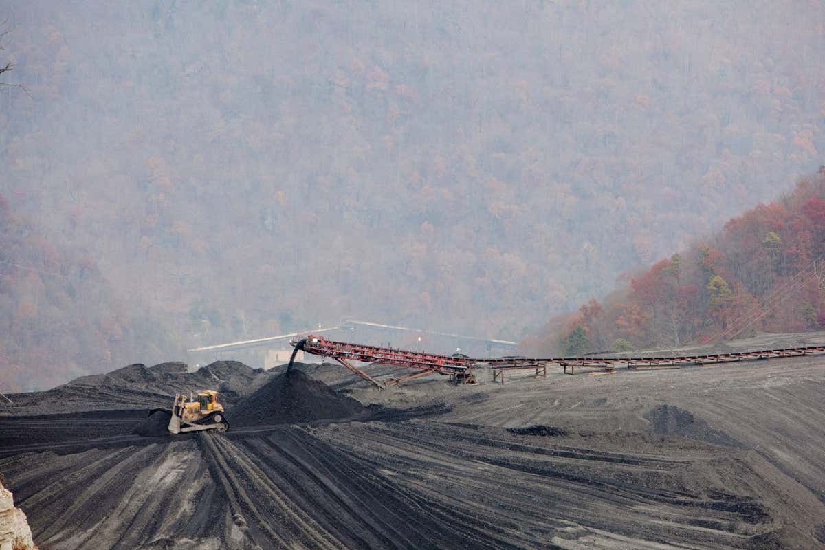 BFERM2 Bulldozer Spread Coal Mine Waste on Impoundment Dam