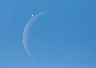 Venus seen next to the crescent moon just before a daytime occultation in 2015