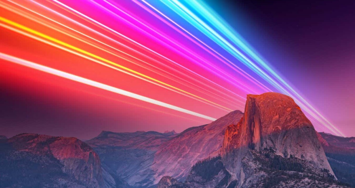 Colorful light trail soaring the sky connecting the world with wireless technology with the Yosemite National Park in California.