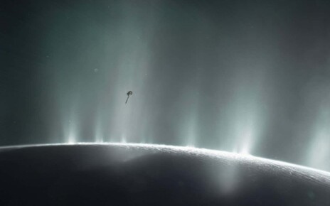 This illustration shows NASA's Cassini spacecraft diving through the plume of Saturn's moon Enceladus, in 2015