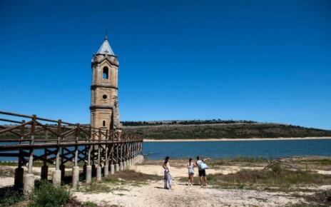 The ruins of San Roque church in Villanueva, normally submerged partially in the waters of the Ebro reservoir, in the northern province of Cantabria, are now visible entirely on solid ground due to the ongoing drought that has caused the reservoir to be at 32.72% of its capacity, on August 8, 2023. The Iberian Peninsula is bearing the brunt of climate change in Europe, witnessing increasingly intense heatwaves, droughts and wildfires. The Spanish met office (AEMET) issued maximum red alerts for parts of Andalusia in the south, the Madrid region in the centre and the Basque Country in the far north. (Photo by ANDER GILLENEA / AFP) (Photo by ANDER GILLENEA/AFP via Getty Images)
