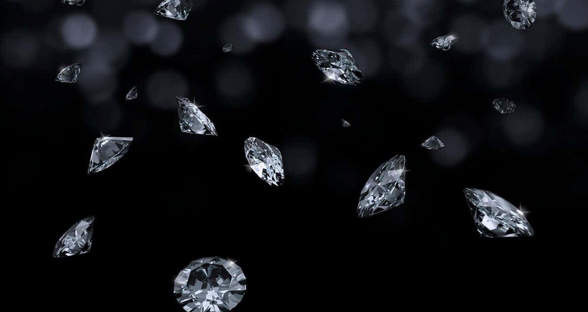 Falling diamonds on black background