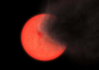 Artist's impression of a cloud of smoke and dust being thrown out by a red giant star