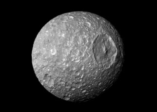 Saturn’s moon Mimas may be hiding a vast global ocean under its ice