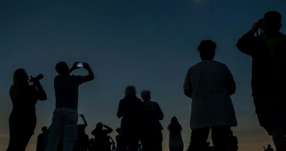 P40XX3 People watching and photographing total solar eclipse, Madras, Oregon
