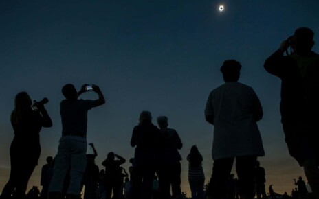 P40XX3 People watching and photographing total solar eclipse, Madras, Oregon