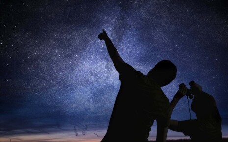 Silhouettes of people observing stars in night sky. Astronomy concept.; Shutterstock ID 586441904; purchase_order: -; job: -; client: -; other: -